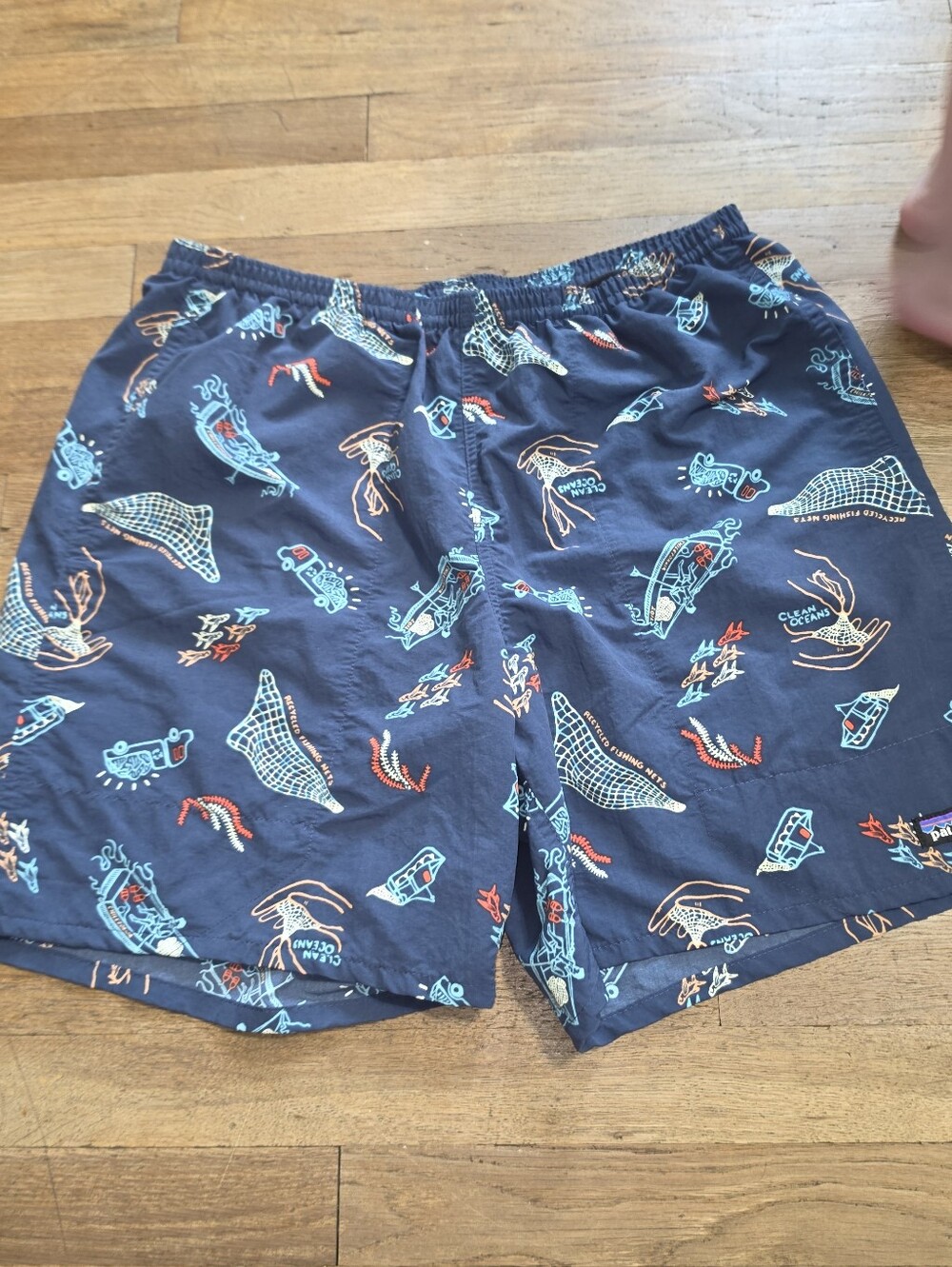 Patagonia Navy Swim Hybrids with Teal and Orange Surf Print